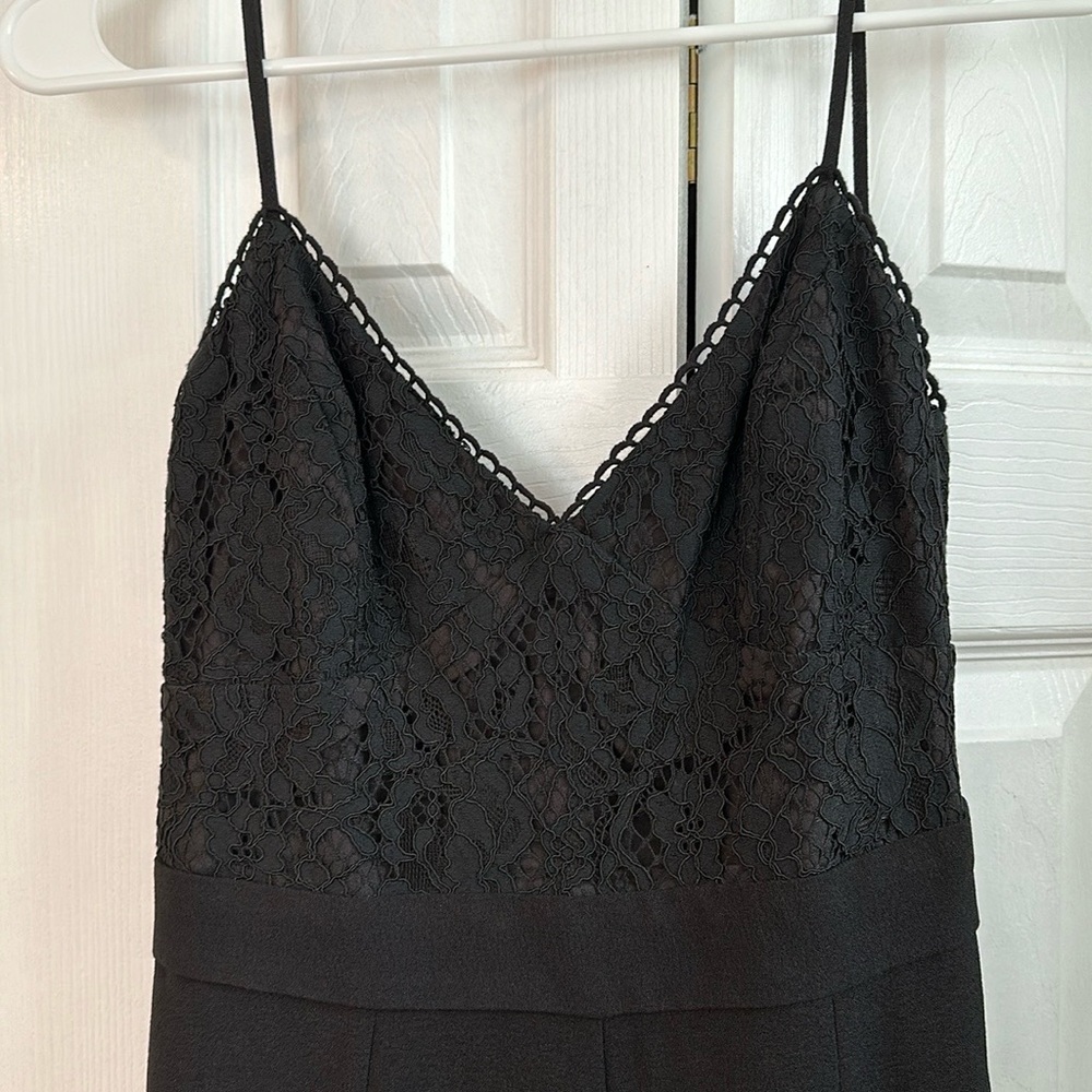 Black jumpsuit with lace detail